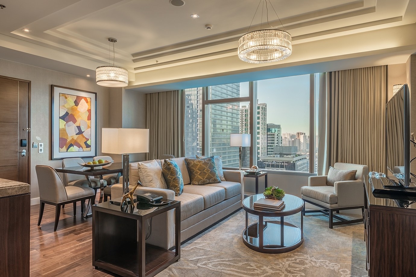 The living and dining room of a Premier two-bedroom residence at Ascott Bonifacio Global City Manila.