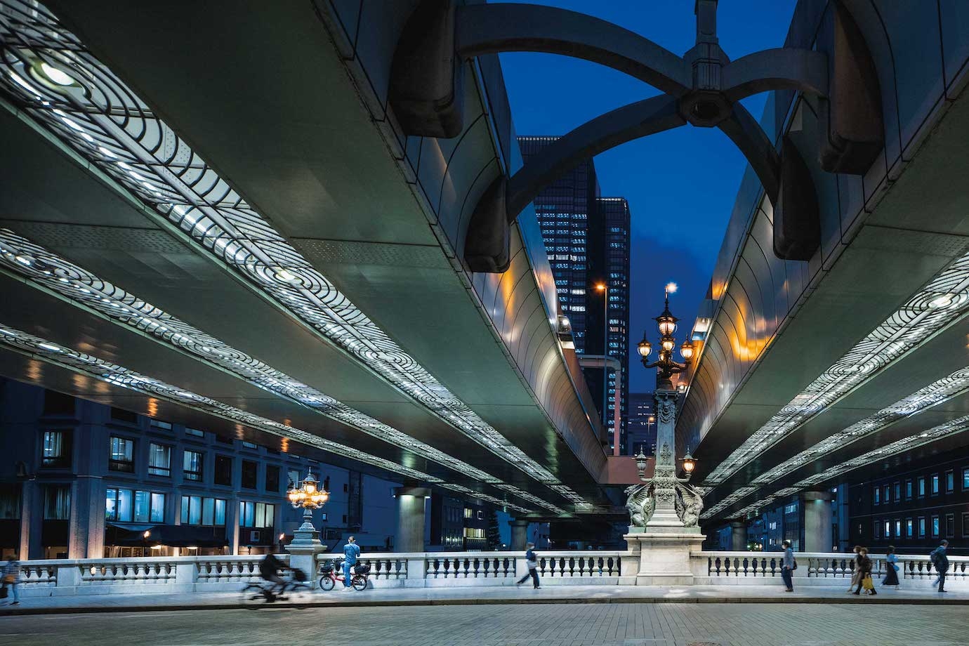 A modern expressway overshadows the historic Nihonbashi Bridge.