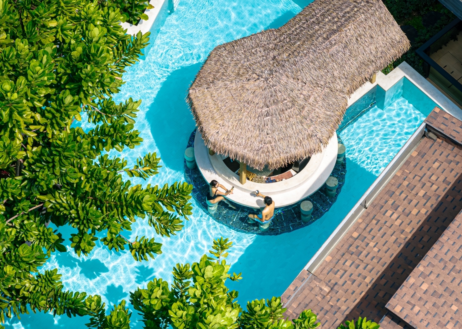 An aerial shot of the swim-up bar at La Miniera Pool Villas Pattaya.
