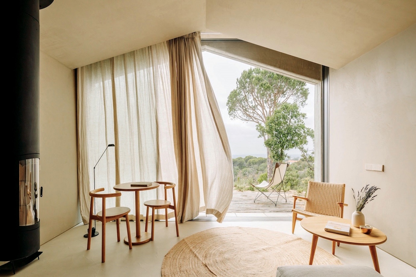 Inside a villa at Pa.te.os, a design-driven hotel overlooking an untamed slice of the Alentejo countryside.