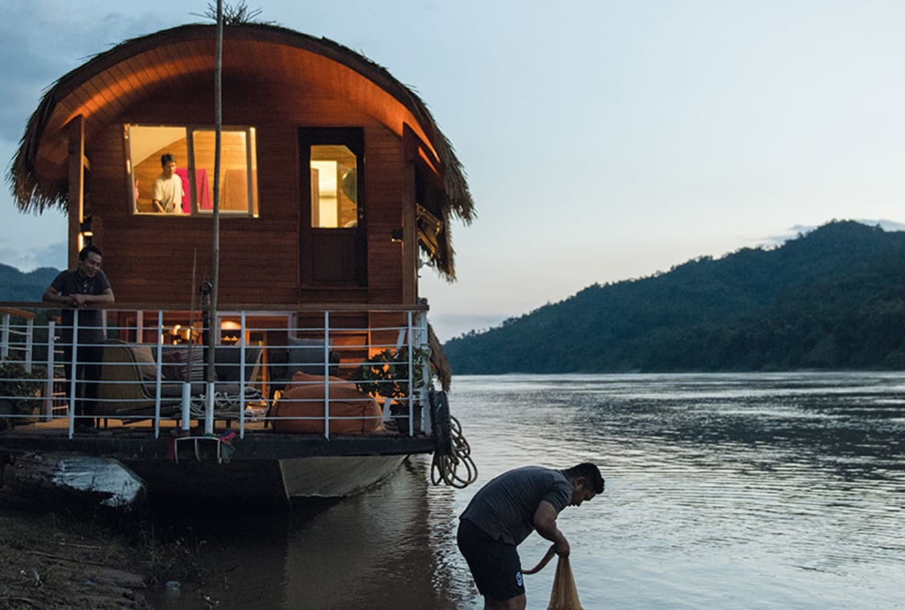 One of the crew fishing as the Gypsy ties up for the night.