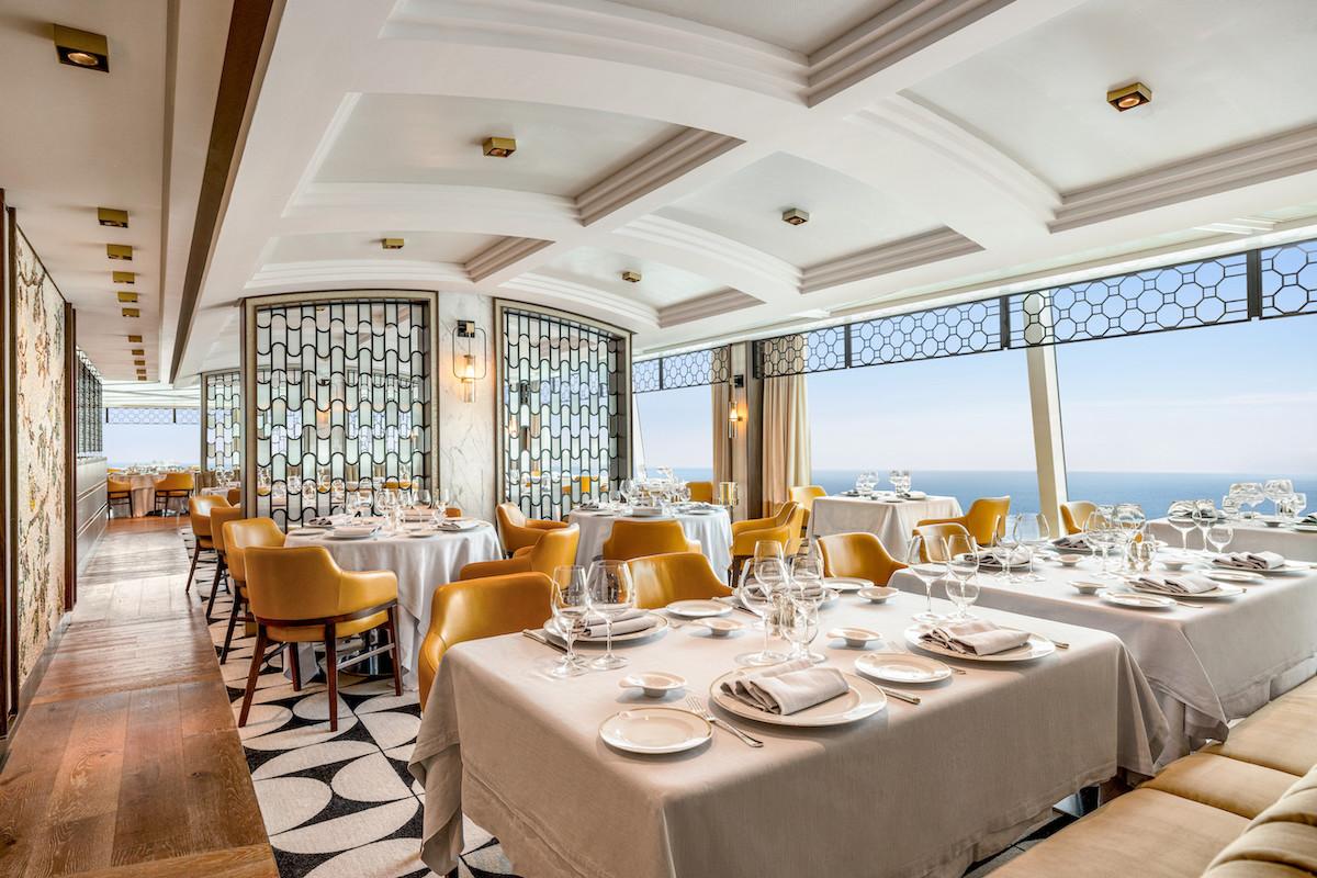 Oceania Cruises - the interior of Toscana restaurant aboard Oceania Vista.