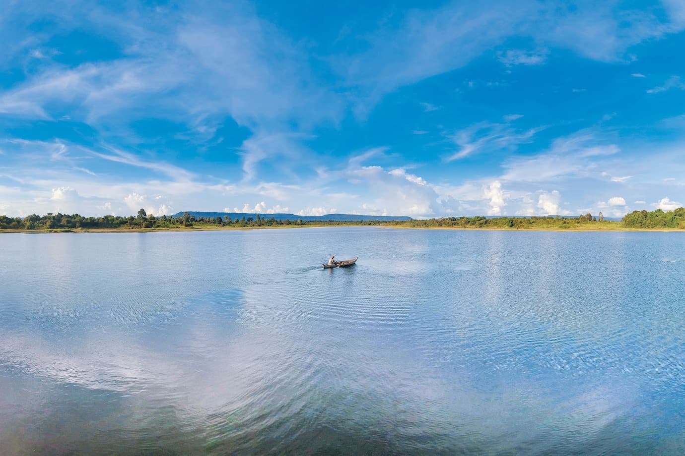 The Phnom Kulen mountain range provides a backdrop to the 35-hectare lake at the heart of Song Saa Reserve.