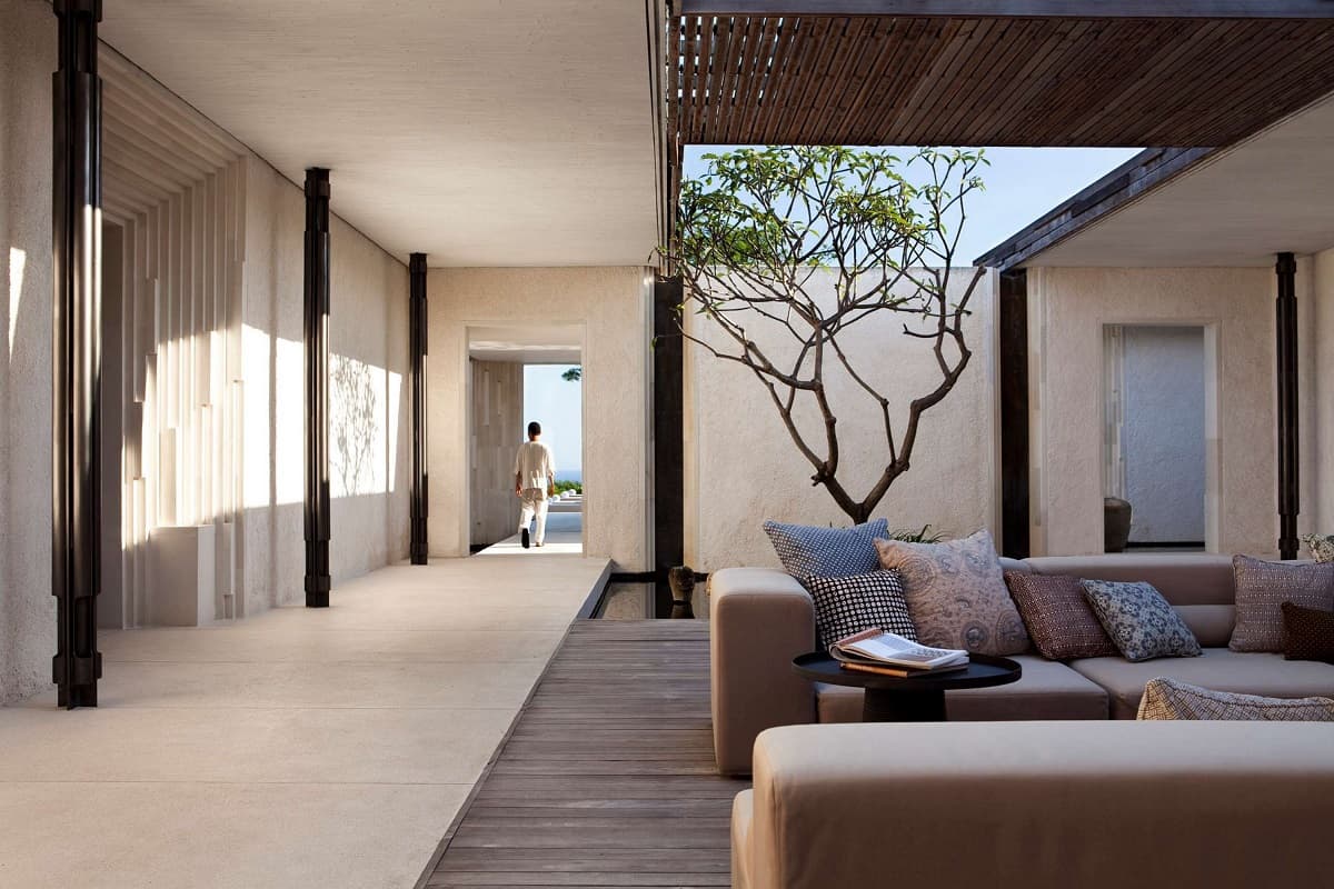 An indoor-outdoor living space at Alila Villas Uluwatu's three-bedroom Hillside Villa.
